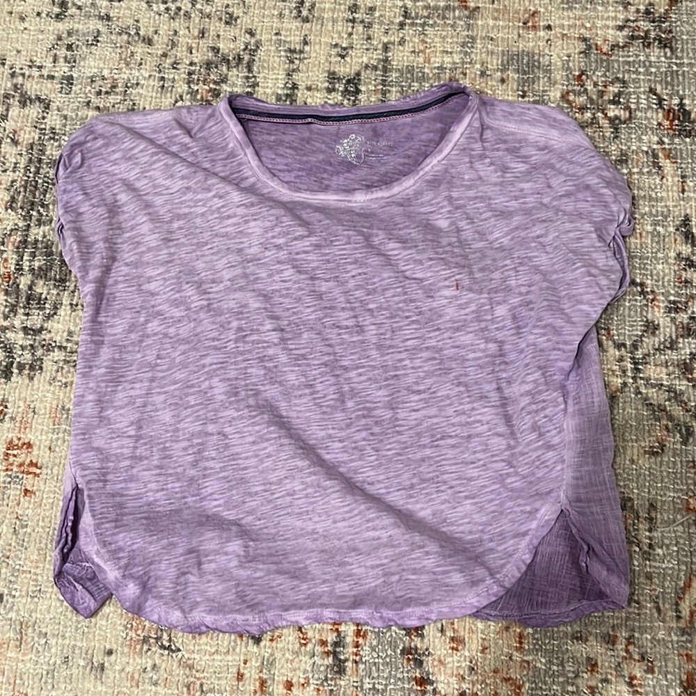 Free people purple top, small red mark